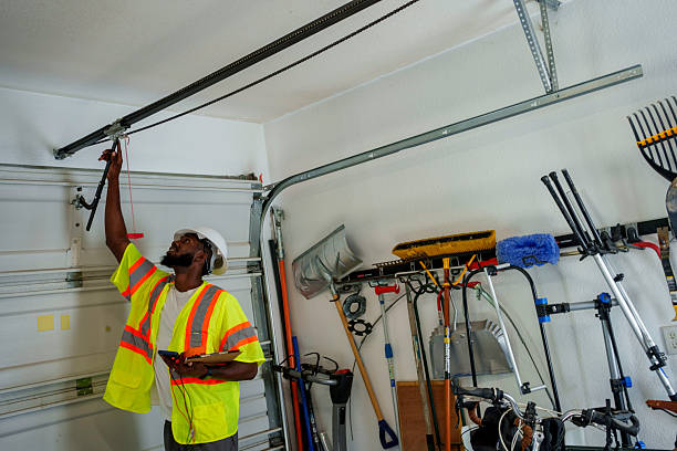 Professional Garage Door Panel Replacement technician working in Palo Alto County County, IA
